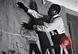 Image of Aaron Douglas and large painting New York City USA, 1937, second 10 stock footage video 65675032306