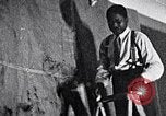 Image of Aaron Douglas and large painting New York City USA, 1937, second 13 stock footage video 65675032306