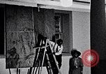 Image of Aaron Douglas and large painting New York City USA, 1937, second 16 stock footage video 65675032306