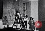 Image of Aaron Douglas and large painting New York City USA, 1937, second 17 stock footage video 65675032306