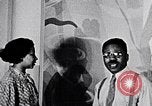 Image of Aaron Douglas and large painting New York City USA, 1937, second 22 stock footage video 65675032306