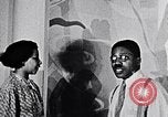 Image of Aaron Douglas and large painting New York City USA, 1937, second 23 stock footage video 65675032306