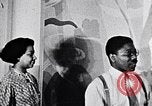 Image of Aaron Douglas and large painting New York City USA, 1937, second 25 stock footage video 65675032306
