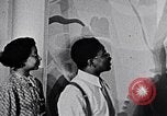 Image of Aaron Douglas and large painting New York City USA, 1937, second 27 stock footage video 65675032306