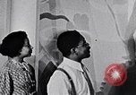 Image of Aaron Douglas and large painting New York City USA, 1937, second 28 stock footage video 65675032306