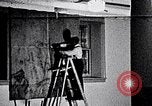 Image of Aaron Douglas and large painting New York City USA, 1937, second 39 stock footage video 65675032306