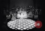 Image of dancers in night club Paris France, 1956, second 7 stock footage video 65675032323