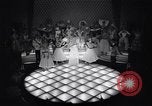 Image of dancers in night club Paris France, 1956, second 8 stock footage video 65675032323
