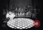 Image of dancers in night club Paris France, 1956, second 17 stock footage video 65675032323