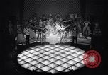 Image of dancers in night club Paris France, 1956, second 20 stock footage video 65675032323