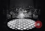 Image of dancers in night club Paris France, 1956, second 21 stock footage video 65675032323
