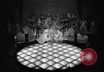 Image of dancers in night club Paris France, 1956, second 22 stock footage video 65675032323