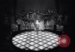 Image of dancers in night club Paris France, 1956, second 23 stock footage video 65675032323