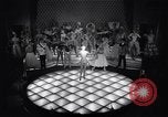 Image of dancers in night club Paris France, 1956, second 24 stock footage video 65675032323