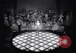 Image of dancers in night club Paris France, 1956, second 25 stock footage video 65675032323