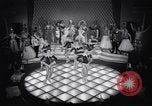 Image of dancers in night club Paris France, 1956, second 31 stock footage video 65675032323