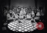 Image of dancers in night club Paris France, 1956, second 32 stock footage video 65675032323