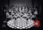 Image of dancers in night club Paris France, 1956, second 33 stock footage video 65675032323