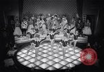 Image of dancers in night club Paris France, 1956, second 34 stock footage video 65675032323
