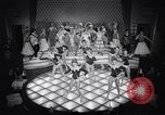 Image of dancers in night club Paris France, 1956, second 36 stock footage video 65675032323