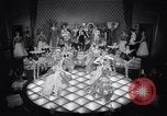 Image of dancers in night club Paris France, 1956, second 41 stock footage video 65675032323