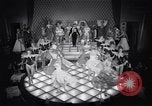 Image of dancers in night club Paris France, 1956, second 42 stock footage video 65675032323