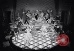 Image of dancers in night club Paris France, 1956, second 44 stock footage video 65675032323