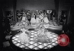 Image of dancers in night club Paris France, 1956, second 48 stock footage video 65675032323
