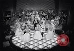 Image of dancers in night club Paris France, 1956, second 54 stock footage video 65675032323