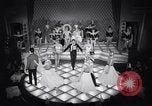 Image of dancers in night club Paris France, 1956, second 58 stock footage video 65675032323