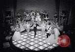 Image of dancers in night club Paris France, 1956, second 59 stock footage video 65675032323