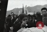 Standbild Schiff Ankunft im Hafen Ostasien, 1955, aus Sekunde 23 historischem Filmmaterial Videoclip 65675032393