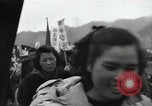 Standbild Schiff Ankunft im Hafen Ostasien, 1955, aus Sekunde 26 historischem Filmmaterial Videoclip 65675032393