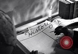 Image of large volume titled history on desk United States USA, 1951, second 3 stock footage video 65675032397