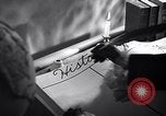 Image of large volume titled history on desk United States USA, 1951, second 4 stock footage video 65675032397