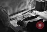 Image of large volume titled history on desk United States USA, 1951, second 7 stock footage video 65675032397