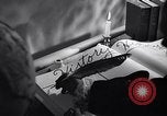 Image of large volume titled history on desk United States USA, 1951, second 8 stock footage video 65675032397