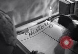 Image of large volume titled history on desk United States USA, 1951, second 13 stock footage video 65675032397