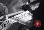 Image of large volume titled history on desk United States USA, 1951, second 20 stock footage video 65675032397