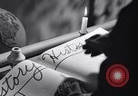 Image of large volume titled history on desk United States USA, 1951, second 23 stock footage video 65675032397