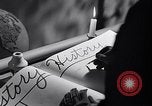 Image of large volume titled history on desk United States USA, 1951, second 27 stock footage video 65675032397