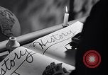 Image of large volume titled history on desk United States USA, 1951, second 28 stock footage video 65675032397