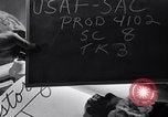 Image of large volume titled history on desk United States USA, 1951, second 32 stock footage video 65675032397