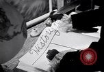 Image of large volume titled history on desk United States USA, 1951, second 37 stock footage video 65675032397