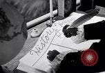Image of large volume titled history on desk United States USA, 1951, second 38 stock footage video 65675032397