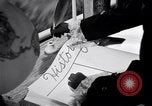 Image of large volume titled history on desk United States USA, 1951, second 43 stock footage video 65675032397