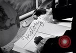 Image of large volume titled history on desk United States USA, 1951, second 44 stock footage video 65675032397