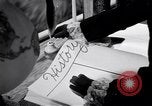 Image of large volume titled history on desk United States USA, 1951, second 48 stock footage video 65675032397