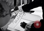 Image of large volume titled history on desk United States USA, 1951, second 49 stock footage video 65675032397