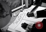 Image of large volume titled history on desk United States USA, 1951, second 60 stock footage video 65675032397